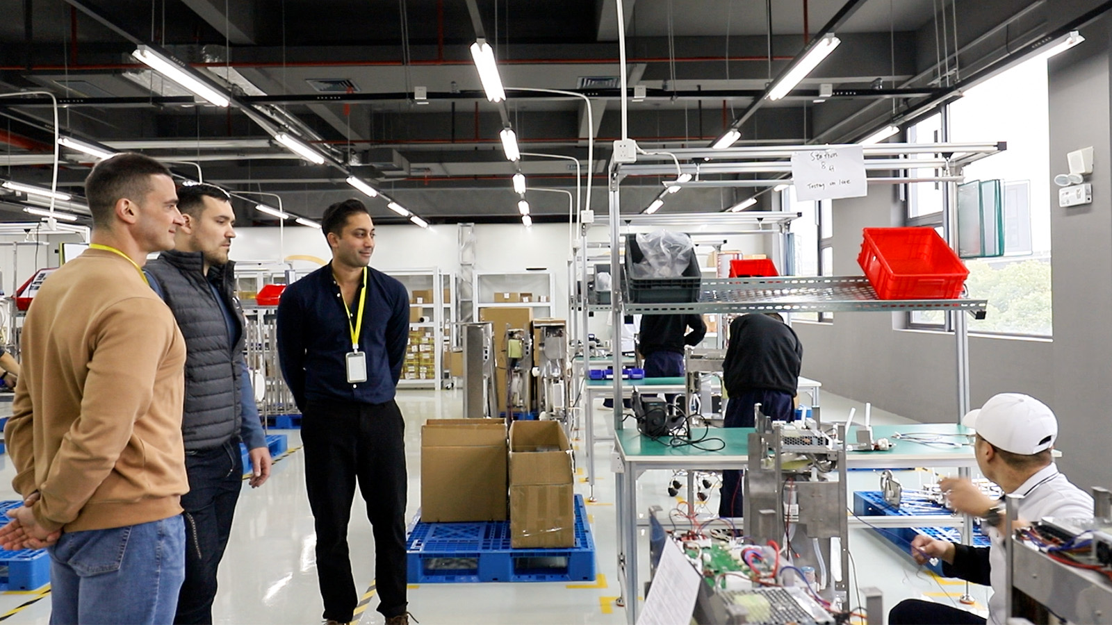 LeWorks operator inspecting parts